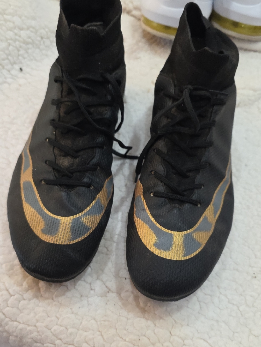 Nike Men’s Black Turf Cleatwith Gold Accent